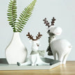 White Winter Reindeer Figurines